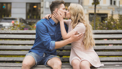 Fototapeta premium Romantic passionate kiss of young couple in love, man and woman dating