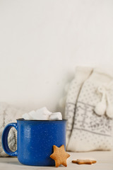 Obraz na płótnie Canvas Christmas drink. Marshmallows in blue mug