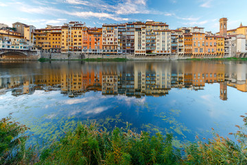 Fototapeta na wymiar Florence. The city embankment along the Arno River.