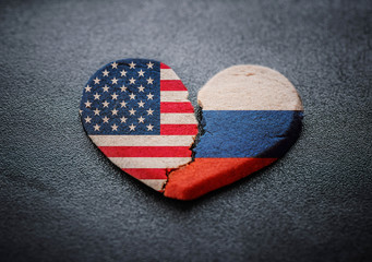 Relations of Russian and America breaking heart symbol 