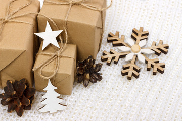 Christmas composition. Christmas gift, pine cones and star on white background
