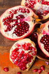 Healthy fruit red ripe pomegranate, rich of Vitamin C, also known as a symbol of prosperity, fertility and used in traditional medicine