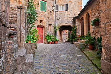 Fototapeta na wymiar Sorano, Grosseto, Tuscany, Italy: alley in the medieval village