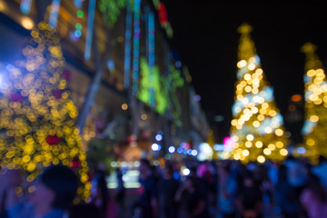 abstract blurred   background of people walk with christmas  lighting