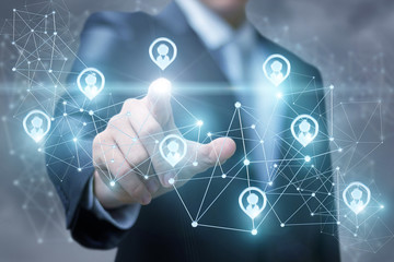 Businessman chooses choosing people icon in the network.