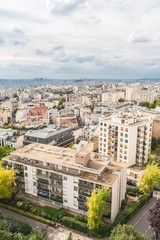 Fototapeta na wymiar Paris, beautiful panorama of the city and the famous monuments, view of Montmartre and the Defense in background 