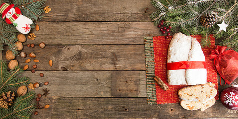 Traditional Christmas dresden cake stollen with candied fruits and almonds. Christmas New Year...