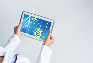 Close of female doctor hands working with tablet pc computer