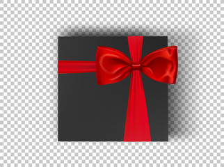 Black square cardboard box with red ribbon and bow on transparent background, top view. Mockup box for design products, package, branding, advertising