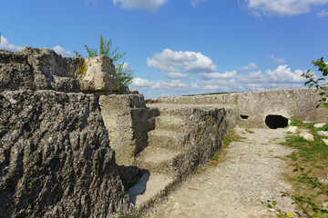 Steps in a large moat on the Eastern side of the medieval town-fortress Chufut-Kale