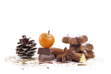 Biscuit in the cinnamon and the star anise with physalis on white background
