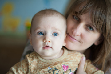 Baby Ellie in loving mother's arms