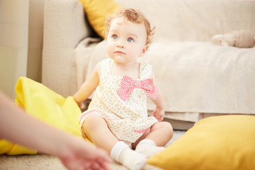 beautiful baby playing in the room