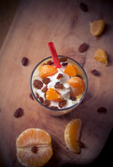 Fresh fruit mandarin yoghurt and raisins