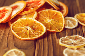 Fototapeta na wymiar Dried orange and lemon slices background