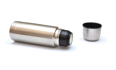 Metal thermos and cup isolated on white background