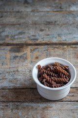 multicolored fusilia pasta (spiral) food background