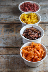 multicolored fusilia pasta (spiral) food background