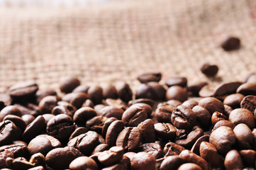 Close-up of coffee beans on the burlap background
