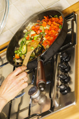 Chopped vegetables on frying pan