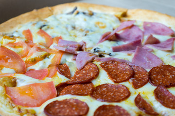 Pizza to order. Pizza in a cardboard box.