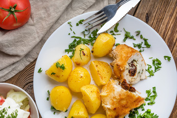 Chicken breast stuffed with cheese and dried tomatoes.