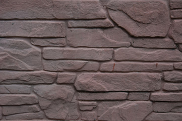 Texture of lilac stones with space for text