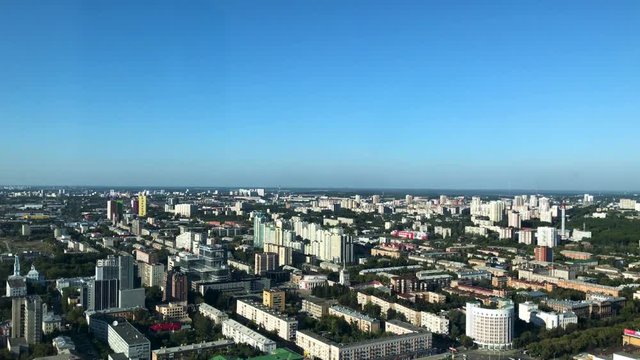 Yekaterinburg downtown aerial panorama. View of the city pond, historical center and Yekaterinburg-City district from the observation deck on the 52nd floor of Vysotsky skyscraper