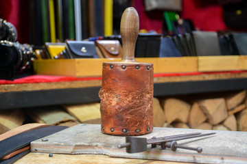A craftsman's tools sitting unused on a table at a festival.