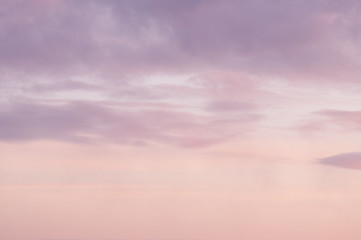 Background from the clouds at sunset or dawn with space for text