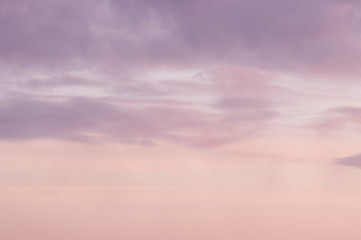 Background from the clouds at sunset or dawn with space for text