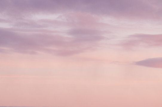 Background from the clouds at sunset or dawn with space for text