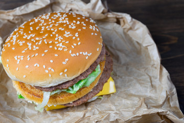 Fast food and a chilled glass of fresh light beer.