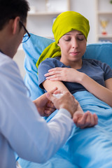 Cancer patient visiting doctor for medical consultation in clini