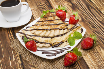 Crepes with Banana and strawberries