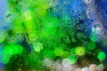misted glass. drops on the glass. bokeh background