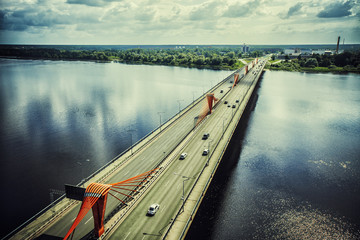Naklejka premium Riga city bridge drone shooting above daugava river