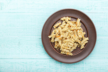 nautically pasta on the wooden background