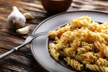 nautically pasta on the wooden background