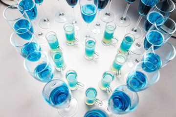 blue champagne in glasses