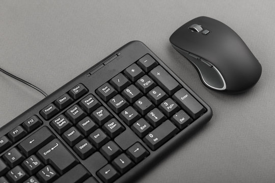 computer mouse near the keyboard