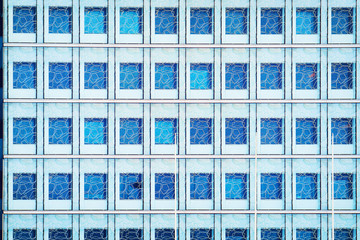 Windows of modern futuristic glass skyscraper Helsinki