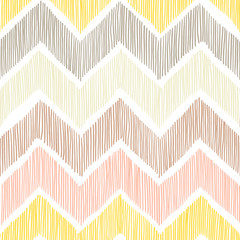 Seamless pattern. Chevron, a zigzag ornament. White, yellow, pink and gray colors. Pritn for textiles in doodle style.