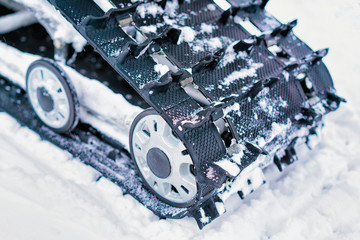 Caterpillar of snowmobile at winter Rovaniemi