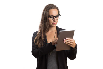 Woman holding tablet touch pad in white background young female intellectual secretary at work.