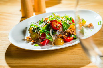 salad with vegetables and noodles with cherry tomatoes