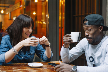 boy and girl cafe and phone