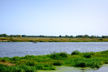 Fisherman floating on a boat