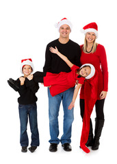 Christmas: Holiday Family Holds Up Little Girl