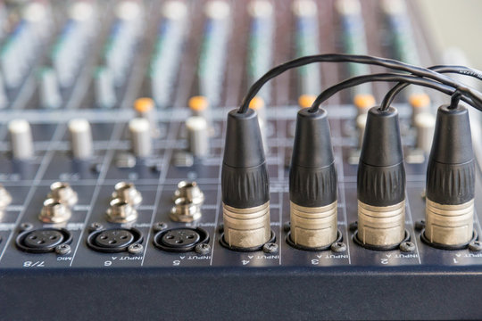 The XLR connectors on the audio mixers.